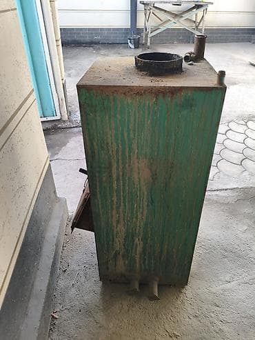 ниже: Твердотопливный водогрейный котел (самодельный/металлический) — 2