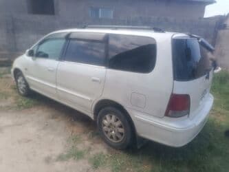 дом в колесах: Honda Odyssey: 1999 г., 2.3 л, Автомат, Минивэн — 2