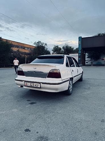 uz fe: Daewoo Nexia: 1996 г., 1.5 л, Механика, Бензин, Седан — 5