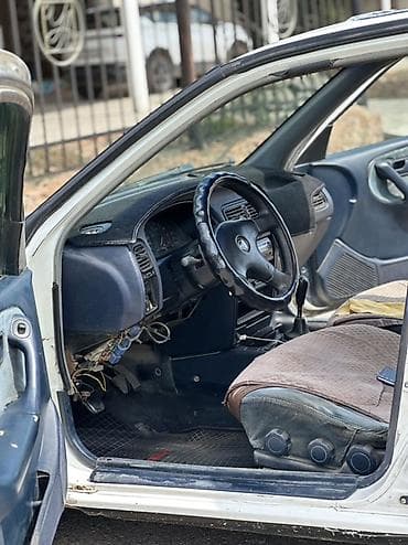 124 e500: Nissan Primera: 1993 г., 2 л, Механика, Бензин, Седан — 7