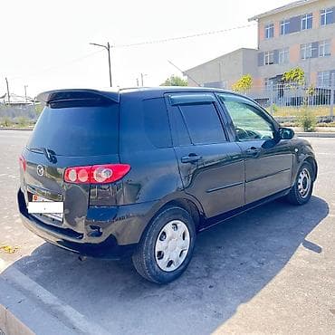 последующим: Mazda Demio: 2004 г., 1.5 л, Автомат, Бензин, Хэтчбэк — 6
