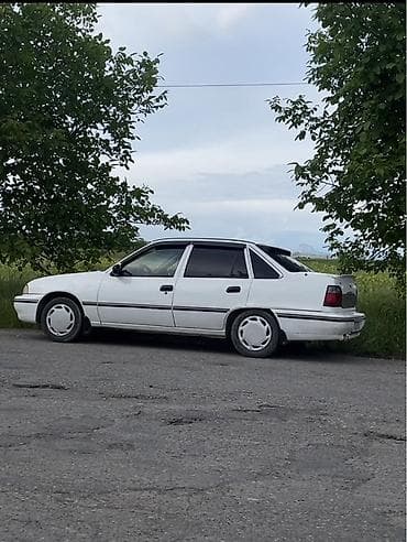 Daewoo Nexia: 1994 г., 1.5 л, Кол менен иштөөчү, Газ, Седан — 10