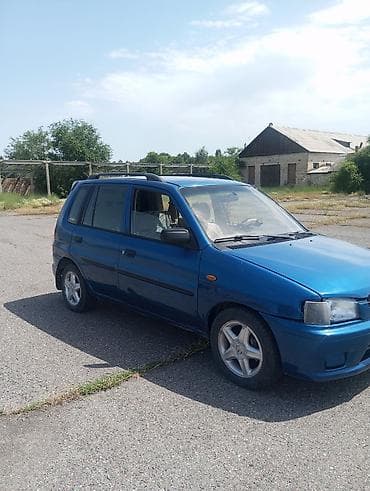нарди руль: Mazda Demio: 1998 г., 1.3 л, Механика, Бензин, Хэтчбэк — 2