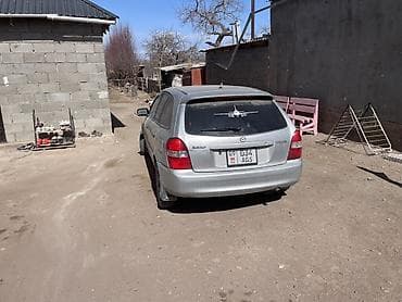 rx 7: Mazda Familia: 2001 г., 1.6 л, Механика, Газ, Универсал — 3