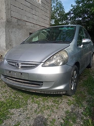 daewoo musso: Honda Fit: 2004 г., 1.3 л, Вариатор, Бензин, Хэтчбэк — 2