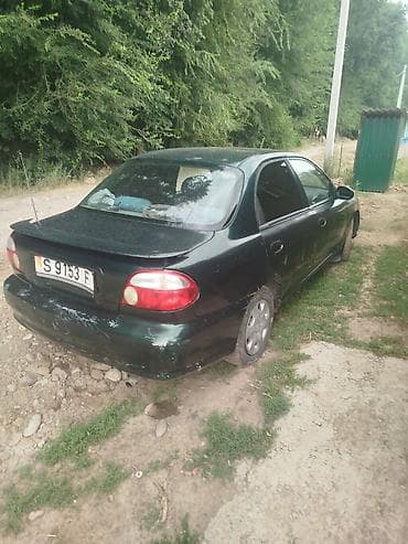 Транспорт: Kia Sephia: 1998 г., 1.5 л, Механика, Бензин, Седан — 1