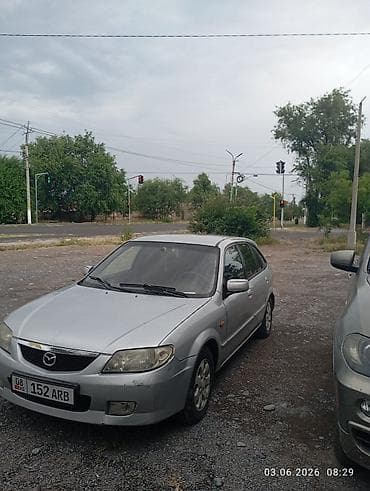 выхлоп 211: Mazda Familia: 2003 г., 1.6 л, Бензин, Хэтчбэк — 2