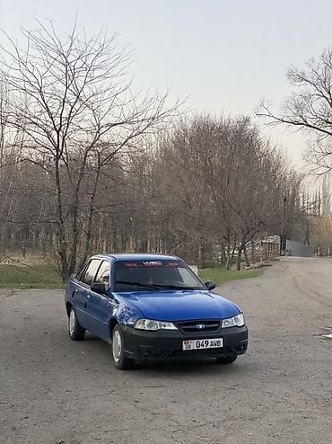 стеклоподъёмник 124: Седан синего цвета с тонировкой задних стекол и черными некрашеными — 8