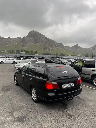chery arizzo: Nissan Primera: 2001 г., Автомат, Бензин, Универсал — 1