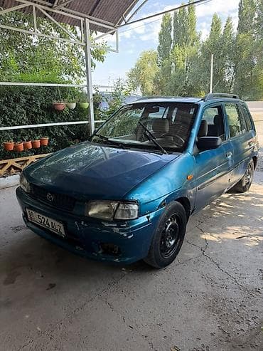 машина капейка: Mazda Demio: 1999 г., 1.5 л, Механика, Бензин — 4