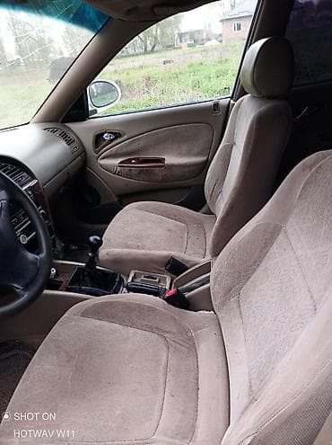 дело лабо: Daewoo Nubira: 1999 г., 1.6 л, Ручные, Бензин, Седан — 6