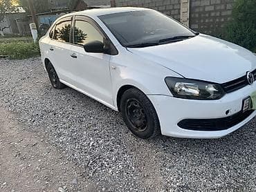 Транспорт: Volkswagen Polo: 2013 г., 1.6 л, Механика, Бензин, Седан — 2