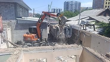 Услуги демонтажа и вывоза строительного мусора спецтехникой. -