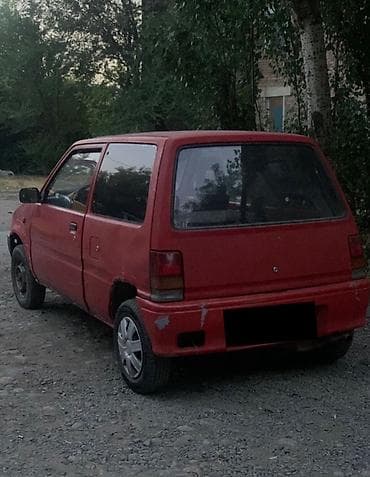 Daihatsu Cuore: 1989 г., 0.9 л, Автомат, Бензин