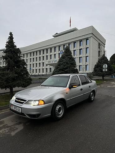 bmw e63: Представлен седан Chevrolet Nexia серебристого цвета. Автомобиль — 3