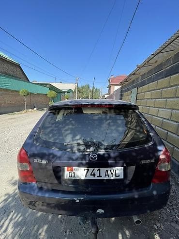 mazda 2: Mazda 323: 2001 г., 1.6 л, Механика, Бензин, Хэтчбэк — 5
