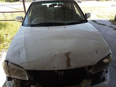 габариты: Mazda Familia: 2000 г., Универсал — 3