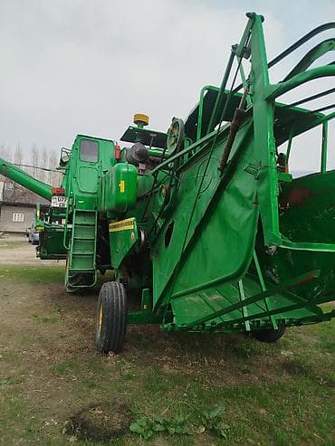 mazda kapella: Зерноуборочный комбайн (самоходный) Описание: - Классическая схема с — 4