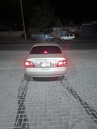 nisan skyline: Mazda 626: 1999 г., 2 л, Автомат, Бензин, Седан — 5