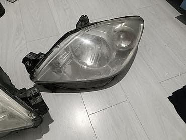 mazda 2: Комплект передних фар Peugeot — 2