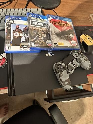 Sony PlayStation: PlayStation 4 Pro (черная, версия с тремя «полосками» корпуса) с — 1