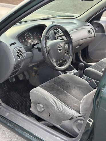 мазду: Mazda 323: 2000 г., 1.3 л, Механика, Бензин, Седан — 7