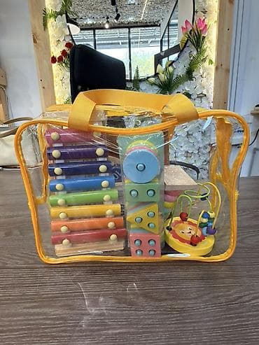 Набор развивающих деревянных игрушек в прозрачной сумке с ручками. В