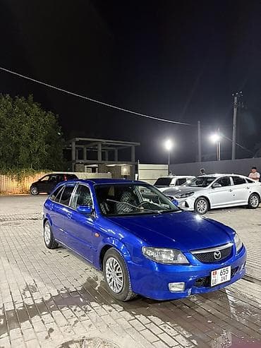 mazda 121: Mazda Familia: 2002 г., 1.6 л, Механика, Бензин, Хэтчбэк — 4
