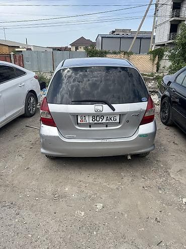 багаж фит: Honda Fit: 2002 г., 1.3 л, Вариатор, Бензин, Хэтчбэк — 2