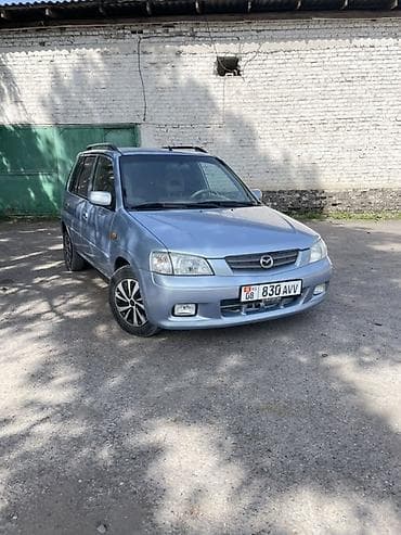 бар авто: Mazda Demio: 2001 г., 1.3 л, Кол менен иштөөчү, Бензин, Хетчбек — 6