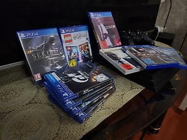 суу матор: Игровая консоль Sony PlayStation 4 (черная, серия Pro) с комплектом — 1