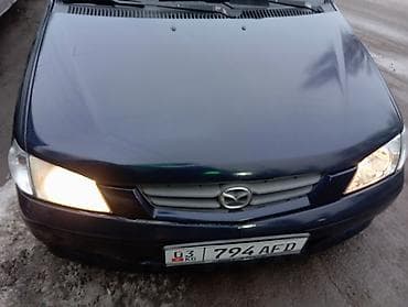 новое авто: Mazda Demio: 2002 г., 1.3 л, Механика, Бензин, Хэтчбэк — 7