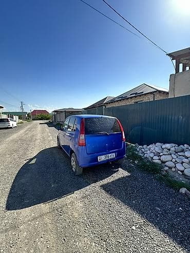 ist машина: Daihatsu Cuore: 2003 г., 1 л, Ручные, Бензин, Хэтчбэк — 6