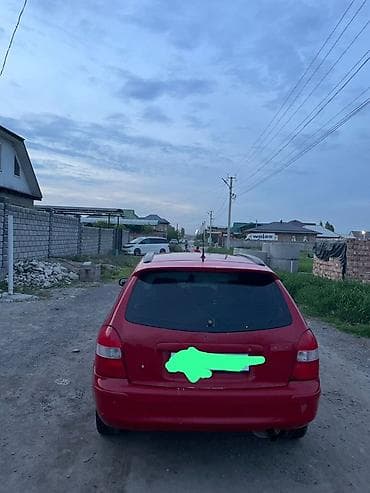 хонда истеп 1: Mazda Familia: 1999 г., 1.5 л, Кол менен иштөөчү, Бензин, Универсал — 2