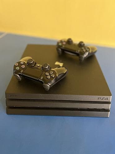 14 pro 256: PlayStation 4 Pro (PS4 Pro) с двумя беспроводными контроллерами — 2