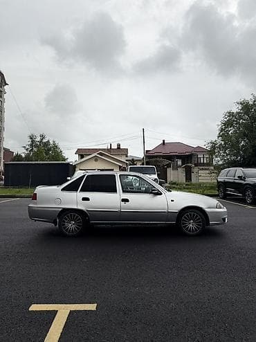 нехсия 2011: Daewoo Nexia: 2009 г., 1.5 л, Механика, Газ, Седан — 5