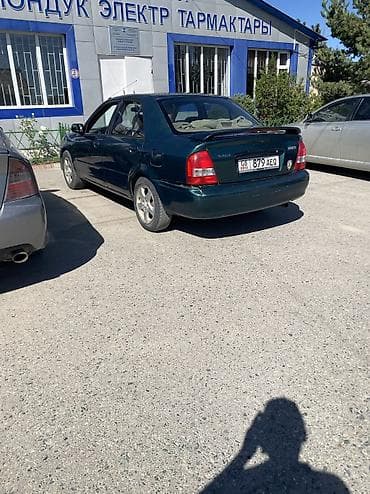 трактор мтз 89 1: Mazda Protege: 2002 г., Автомат, Бензин — 4
