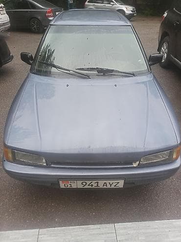 Mazda 323: 1990 г., 1.8 л, Механика, Бензин, Хэтчбэк