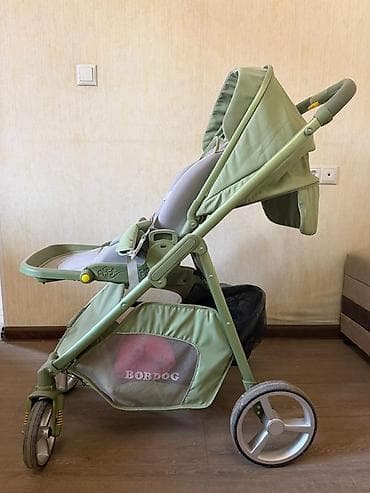 Прогулочная коляска BOBDOG, цвет оливковый. Особенности: - Легкая