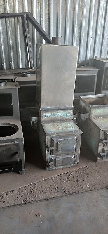 газовые настенные котлы: Твердотопливная печь-водогрей (буржуйка с баком) Описание: - — 1