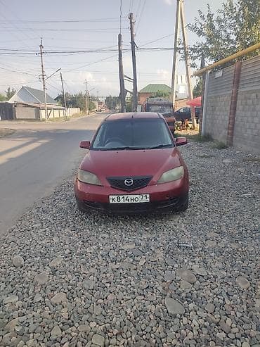 простой: Mazda Demio: 2002 г., Бензин, Хэтчбэк — 5