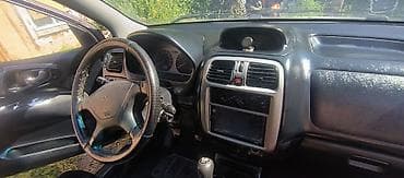 2000: Mitsubishi Space Wagon: 2002 г., 1.6 л, Механика, Бензин, Минивэн — 6