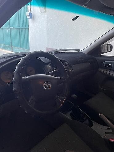 фередо 124: Mazda Familia: 2003 г., 1.6 л, Ручные, Бензин, Седан — 6