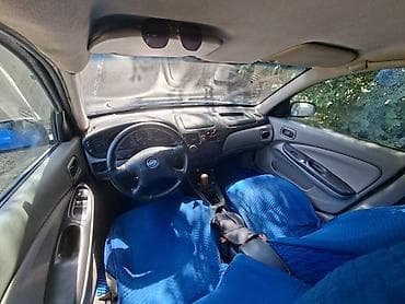 жак бу: Nissan Almera: 2001 г., 1.5 л, Кол менен иштөөчү, Бензин, Седан — 4