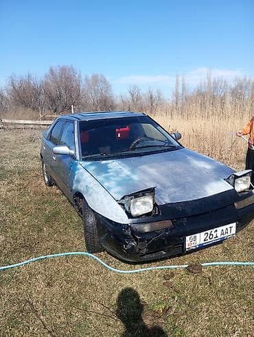 опел вектра с: Mazda 323: 1990 г., Лифтбек — 2