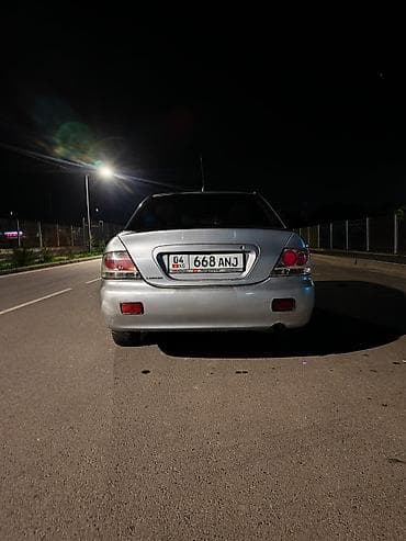 митсубиси грузовой: Mitsubishi Lancer: 2004 г., 1.6 л, Автомат, Бензин, Седан — 6