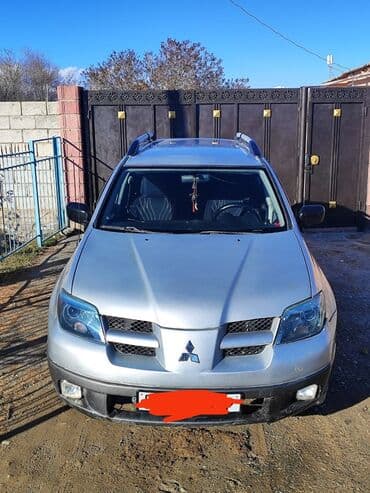 муссо авто: Mitsubishi Outlander: 2004 г., 2.4 л, Автомат, Бензин, Кроссовер — 9