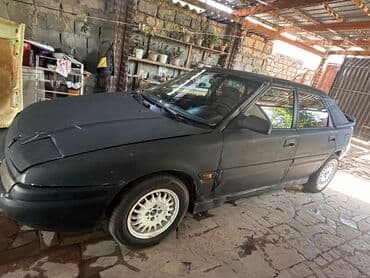 мазда фк: Mazda 323: 1991 г., 1.8 л, Механика, Бензин, Хэтчбэк — 2