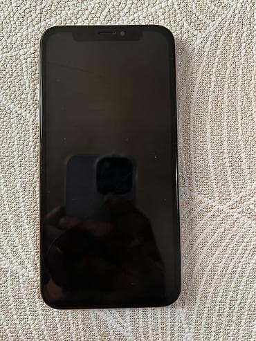 IPhone XS, серебристый, 64 ГБ Особенности: - Двойная основная камера — 2