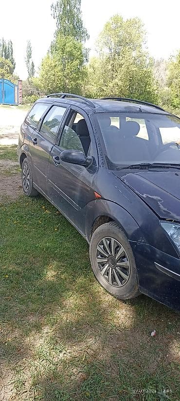 Транспорт: Ford Focus: 2000 г., 1.8 л, Кол менен иштөөчү, Бензин, Универсал — 3
